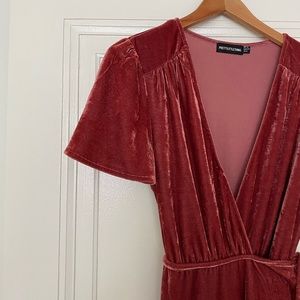 Pink velvet wrap dress.